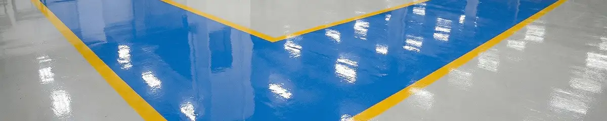 A factory floor professionally covered and marked with epoxy flooring in Pasadena, CA