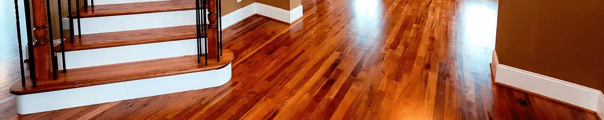 Base floor of a staircase with professionally restored wood flooring in Pasadena CA