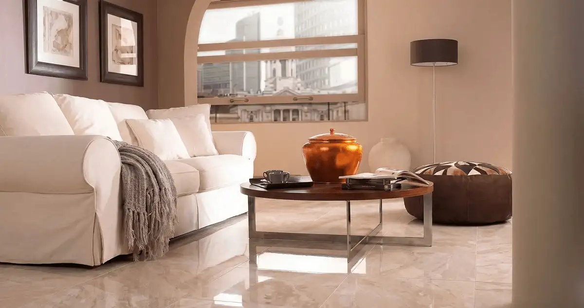 Modern living room with professionally installed marble flooring, a beige sofa, coffee table in Pasadena, CA