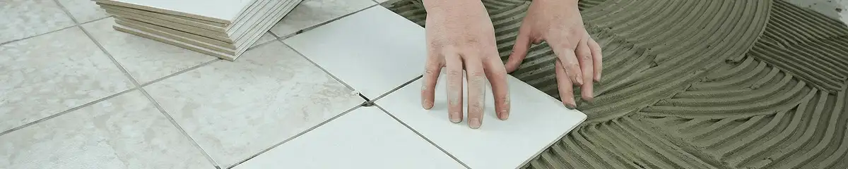Professional installing white tile floors in Pasadena, CA