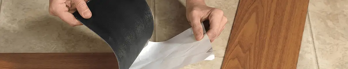 A professional installing vinyl flooring in Pasadena, CA